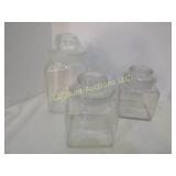 3 clear canisters