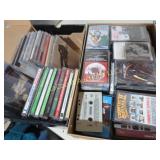 assorted media cds casette tapes