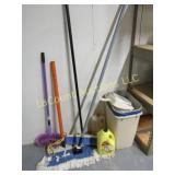 cleaning supplies mops trash baskets