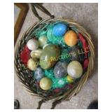 vintage stone or marble easter eggs in basket