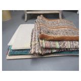 assorted rugs