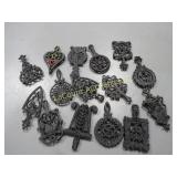 many vintage cast trivets minis