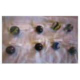 8 unique marbles goldstone rhodonite crinoid