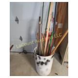 assorted poles measuring sticks dowels