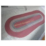 2 matching braided area rugs