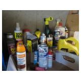 lots of  garage fluids oils sprays