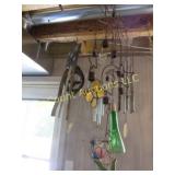 many hanging outdoor wind chimes stained glass