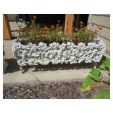 cast iron garden planter w flowers