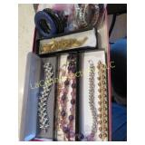 assorted vintage jewelry bracelets belt buckles