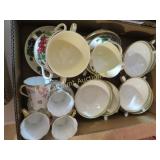 assorted tea cups & saucers