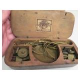 vintage balance scale in wood storage box