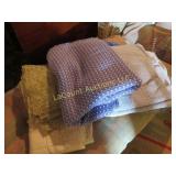 assorted linens table cloths