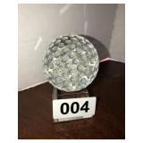Small glass ball on stand