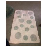 3 rugs and 2 bath mats