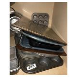 Misc muffin and other baking pans, collander