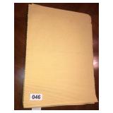 4 yellow placemats and 6 colorful place mats