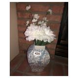 Vase with faux flowers