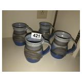 Signed stoneware mugs