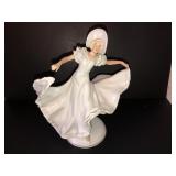 Porcelain dancing lady figurine