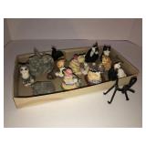 Assorted cat figurines
