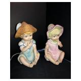 Blue boy and pinky porcelain night lights 7in X2
