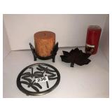 2 trivets, candle holder, and 2 candles