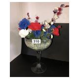 Large stemmed vase floral arrangement