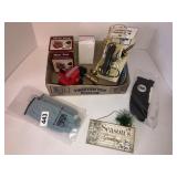 2 pairs of gloves, mini vise, misc