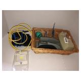 Basket with staplers, tape dispenser, router