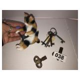 Old keys and resin sitting cat