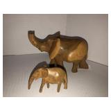 2 hand carved wooden elephants 1-1/2in and 4in