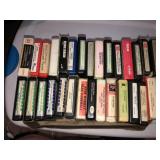 8 track tapes in cases