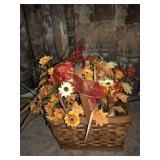 Faux floral fall arrangement in basket