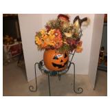 Metal art flower planter with fall arrangement