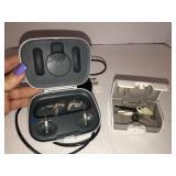 2 pairs of unitron hearing aids