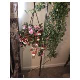 Tension pole with faux flower decor