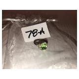 Ring marked PAT 2783140 with green stone