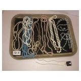 Flat of beaded necklaces