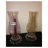 2 hurricane lamps