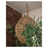 Hanging planter with faux greenery