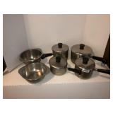 2 stainless bowls and 4 pots with lids Reverware