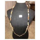 Long beaded stone necklace