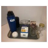 Water bottle, kitchen timer, measuring cup, misc