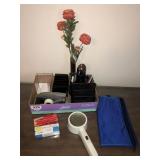 Stapler, magnifying glass, pens, misc