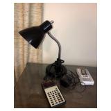 Desk lamp, Texas Instrument calculator, weather