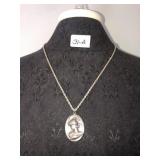 Cameo locket marked sterling, chain unmarked