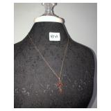 Cross pendant marked 14K and unmarked chain