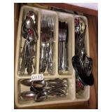 Assorted flatware and serving pieces