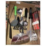 Kitchen utensils with knife sharpener