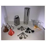 Grater, measuring cups, funnels, misc